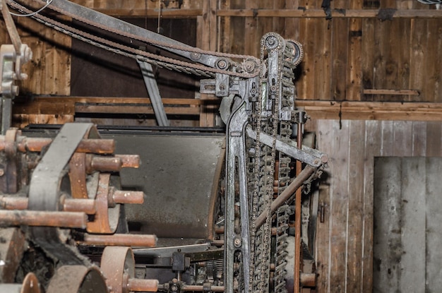 Machine with chain and belt