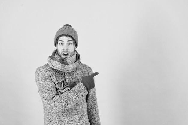 Photo macho in warm hat sweater scarf fashion