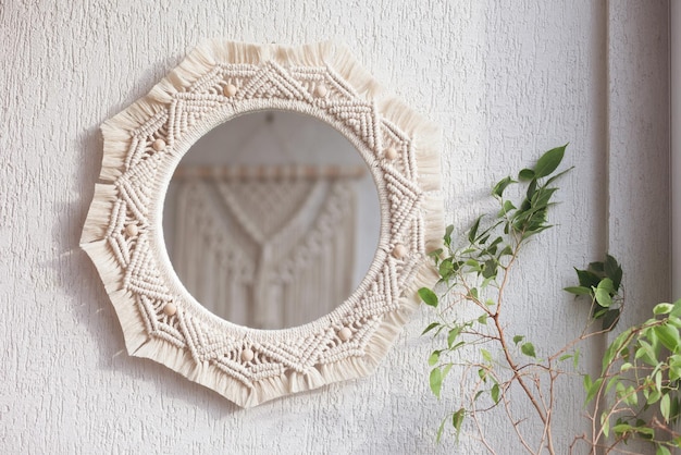 Macrame mirror on a white wall Ecostyle Natural materials