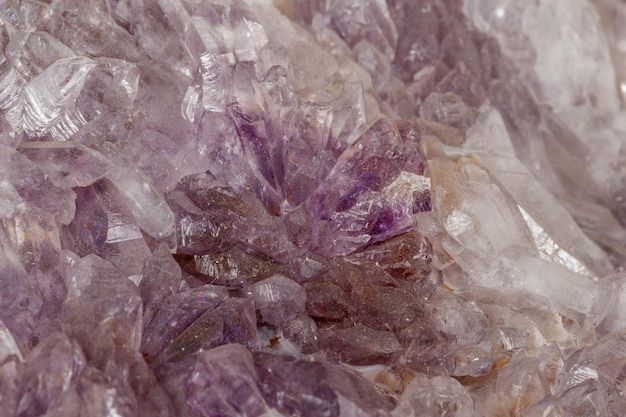 Macro of amethyst mineral stone on black background