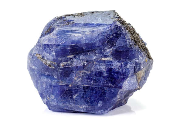 Photo macro blue tourmaline mineral stone on white background