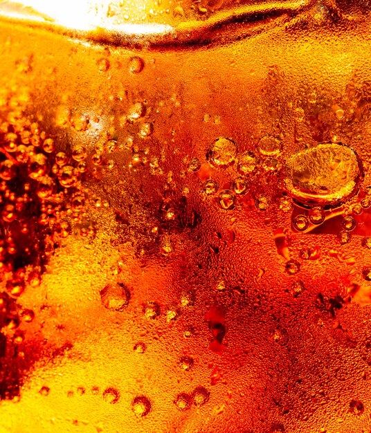 macro cola texturecola met ijs voedsel achtergrond cola close-up ontwerp element bier macro bubbels