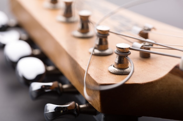 Macro of electric guitar headstock