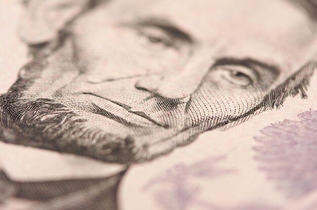 Premium Photo Macro of Five Dollar Bills Lincoln
