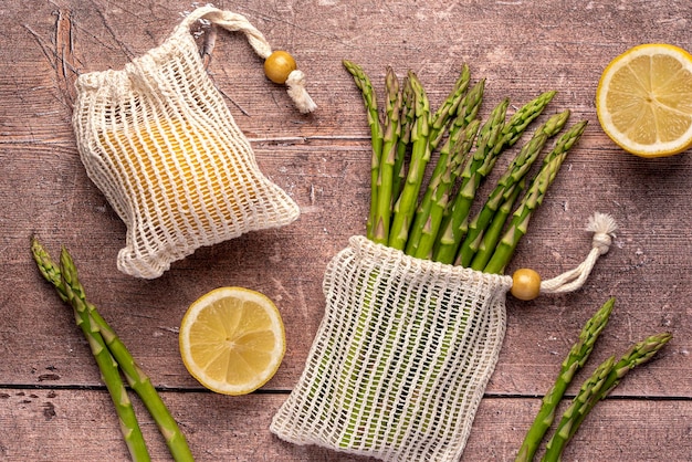 Macro food photography of raw asparagus and lemon