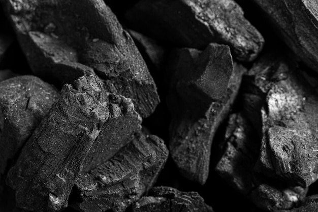 macro houtskoolZwarte kolen achtergrond houtskool houtachtig zwart veel houtskool is een lichtgewicht