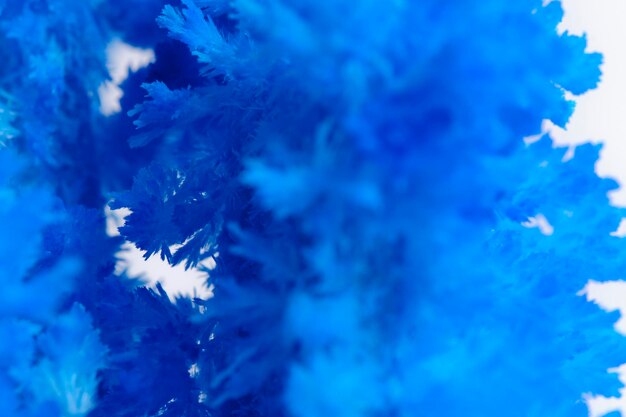 Photo macro image blue salt crystal on white background