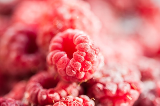 Macro image of frozen raspberry berries, small depth of field