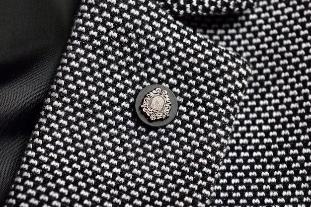 Macro Image of Lapel Pin on the blazer