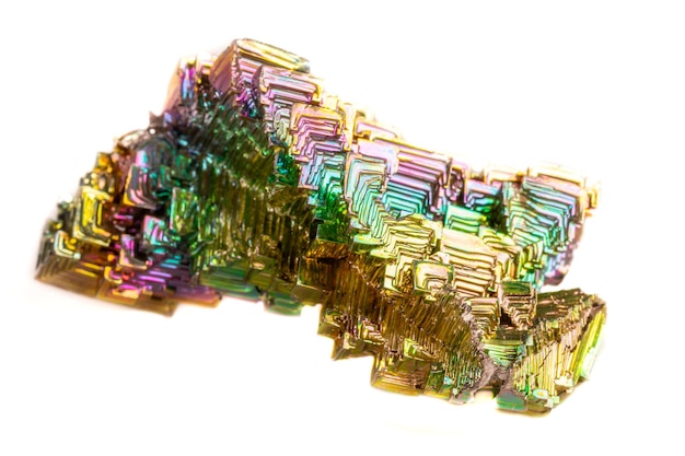 Macro of the mineral bismuth stone on a white background