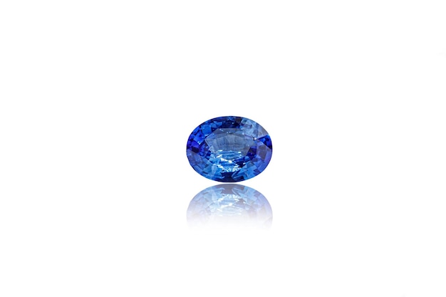 Macro mineral faceted sapphire stone on a white background