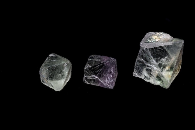 Macro mineral fluorite stone on balck background