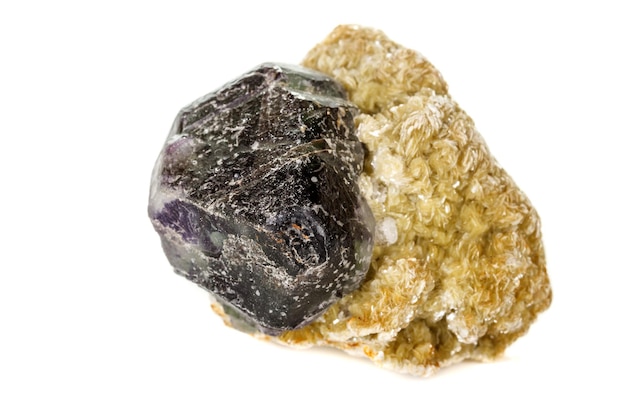 Macro mineral fluorite stone on white background