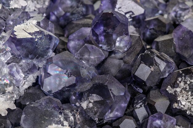 Macro mineral fluorite stone on white background