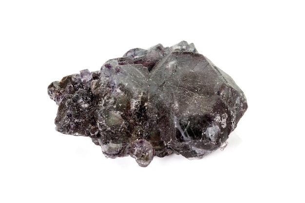 Macro mineral fluorite stone on white background