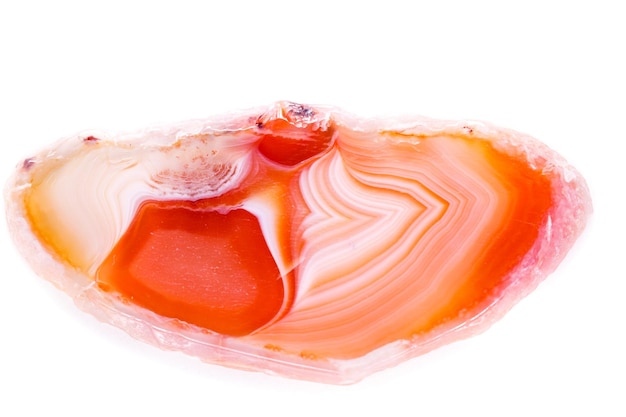 Macro mineral orange agate in crystals on white background