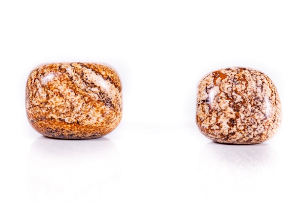 Macro mineral rock jasper landscape sandy on white background