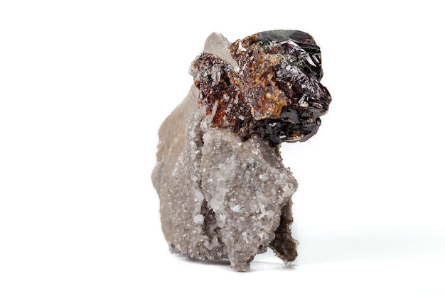 Macro of mineral Sphalerite stone on microcline on white background