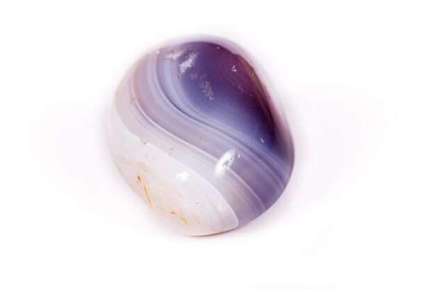 Macro mineral stone Agate Botswana gray on white background