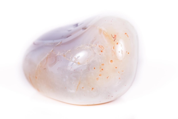 Macro mineral stone Agate Botswana gray on white background