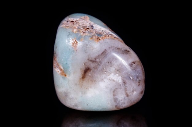 Macro Mineral Stone Amazonite on a black background