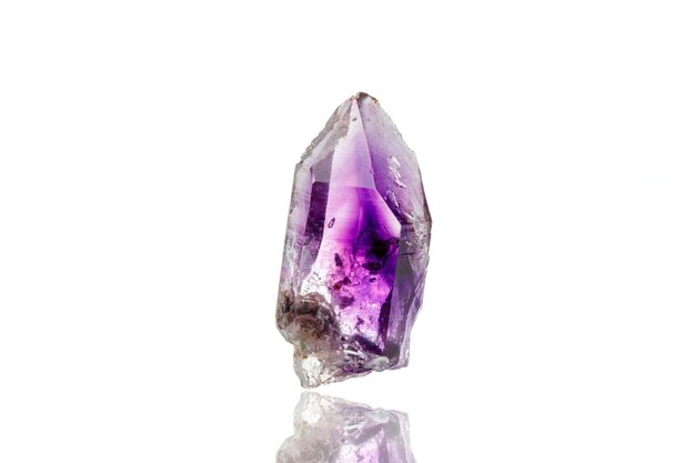 Photo macro mineral stone amethyst on a white background