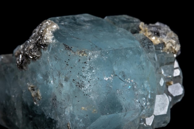 Macro mineral stone Aquamarine on a black background