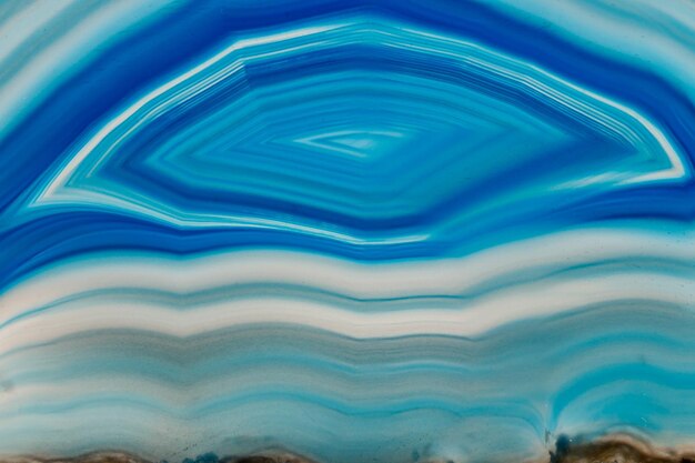 Macro mineral stone Blue Agate breed a white background