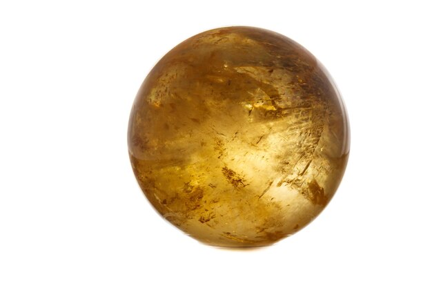 Macro mineral stone Calcite orb on a white background