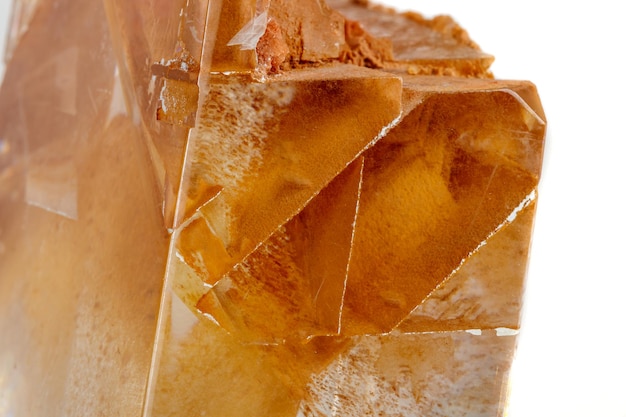 Macro mineral stone Calcite on a white background