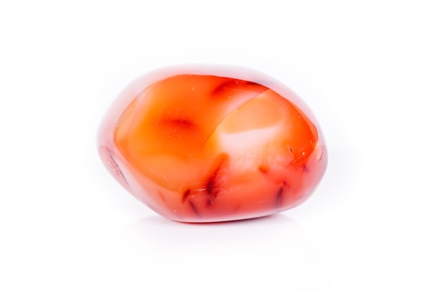 Macro mineral stone Carnelian on white background