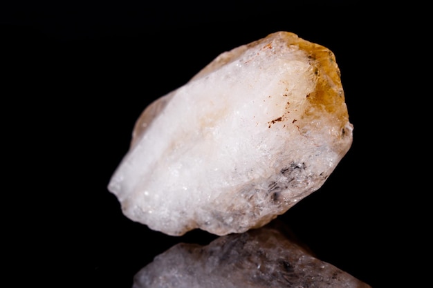 Macro mineral stone Citrine on black background