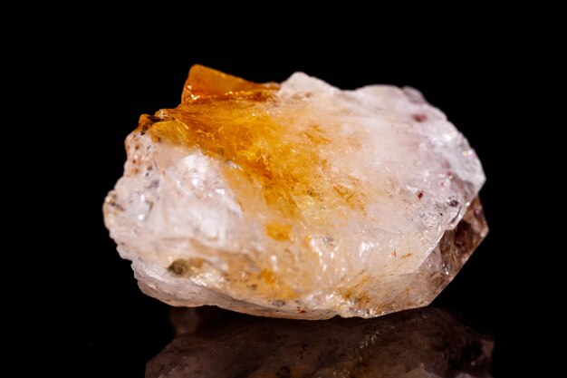 Macro mineral stone Citrine on black background