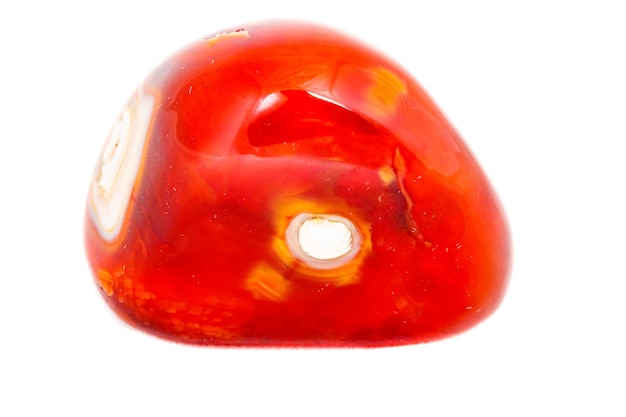 Macro mineral stone Cornelian on a white background