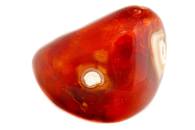 Macro mineral stone Cornelian on a white background