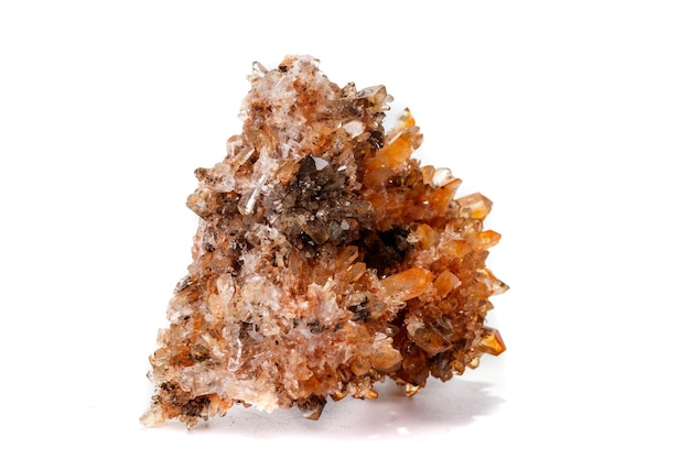 Macro of mineral stone Creedite on microcline on white background