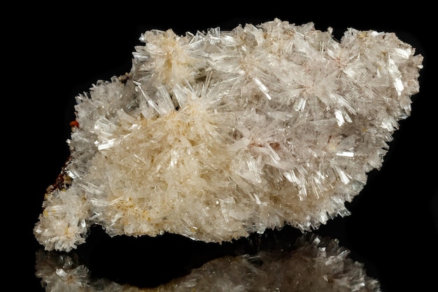 Macro mineral stone crystals Hemimorphite rock on a black background