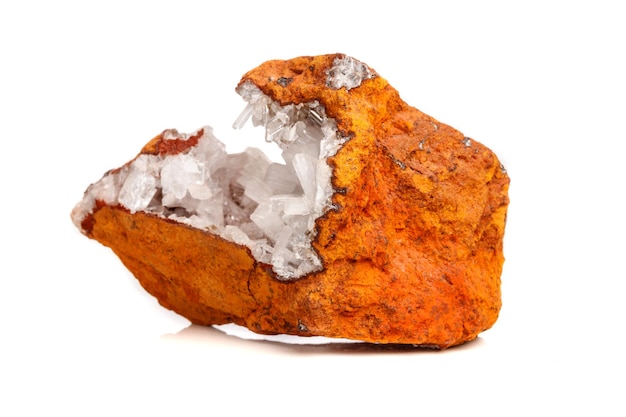 Macro mineral stone crystals Hemimorphite rock on a white background