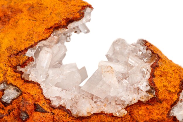 Macro mineral stone crystals Hemimorphite rock on a white background