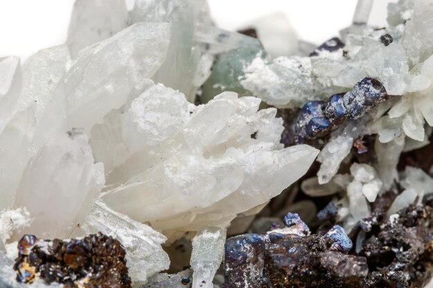 Macro mineral stone Drusus quartz with sphalerite in the rock a white background