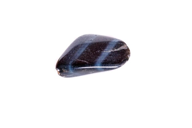 Macro mineral stone Falcon eye on a white background