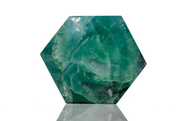 Macro mineral stone Fluorite crystal on a black background