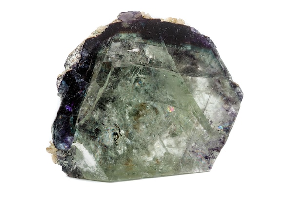 Macro of a mineral stone Fluorite on a white background