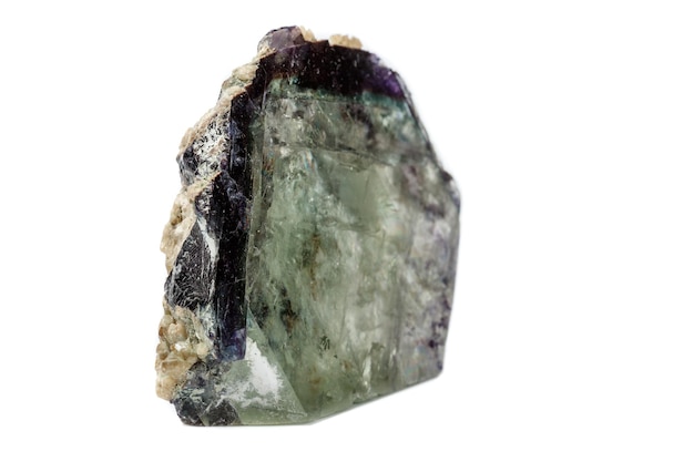 Macro of a mineral stone Fluorite on a white background