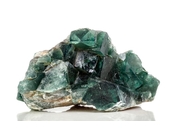 Macro mineral stone Fluorite on a white background