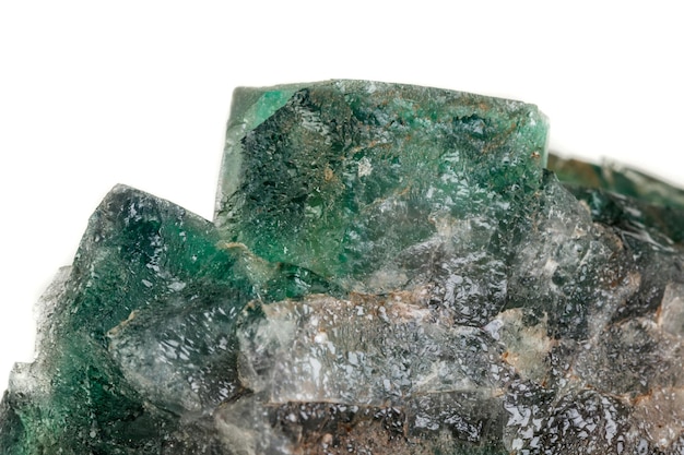 Macro mineral stone Fluorite on a white background