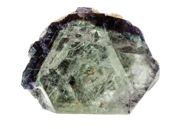 Macro of a mineral stone Fluorite on a white background