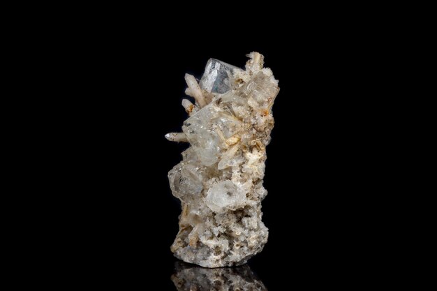 Macro mineral stone fluorite with quartz against black background