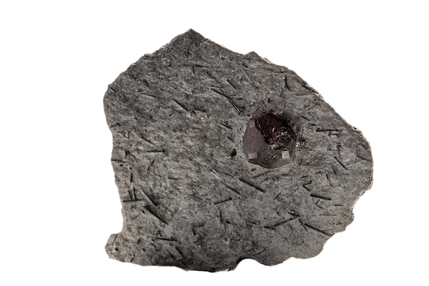 Macro mineral stone Garnet in rock on a white background