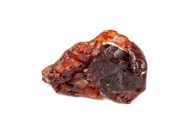 Macro mineral stone Garnet Spessartine on a white background